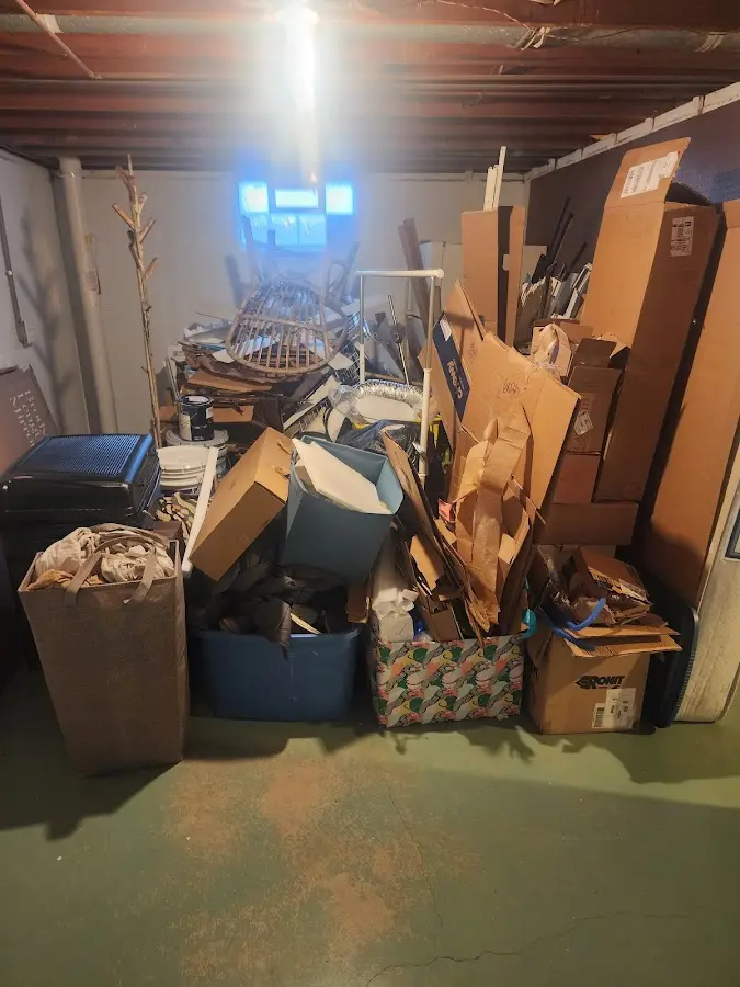 Roll-off dumpster container at job site for 4 Yard Dumpster Rental in Mount Carmel